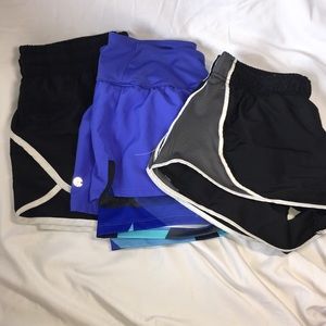 three pairs of athletic shorts, all size medium